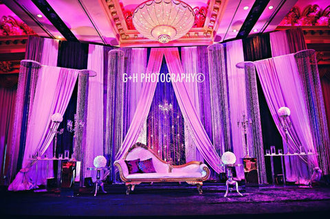 Reception Backdrop Decor with Draping and White Love Sofa